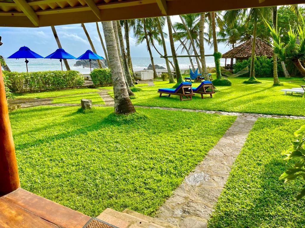 Rockside Cabanas Hotel Unawatuna Exterior photo